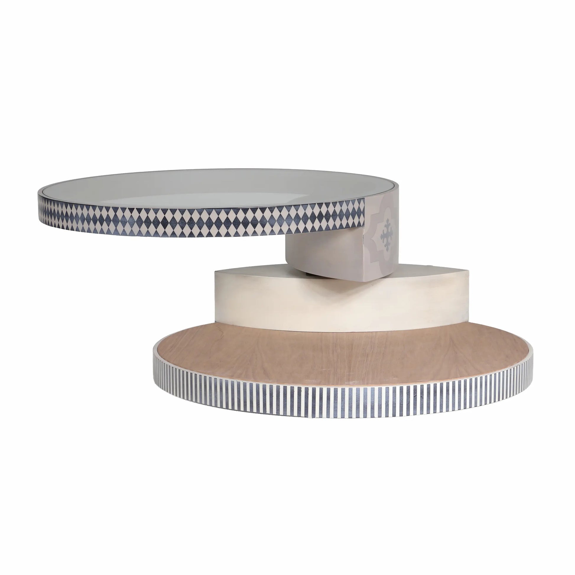 Mesa de centro Annais de diseño artesanal con volúmenes circulares superpuestos.
