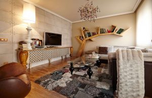 Librero Tree Lola Glamour con estructura orgánica inspirada en ramas para salón con estilo
