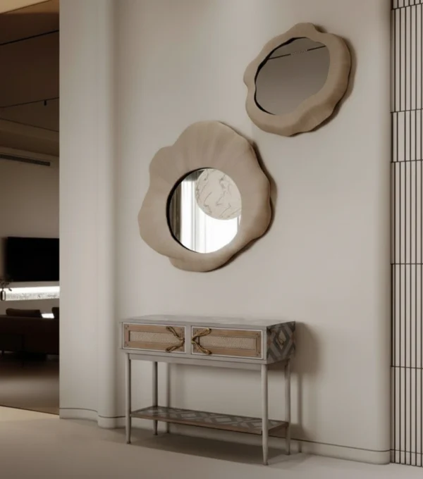 Consola Zen, un mueble de diseño étnico en gris con patrones geométricos, dos cajones y tiradores dorados con forma de lazo
